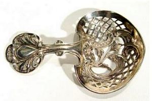 Victorian ornate pierced silver sugar spoon